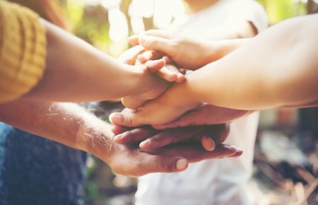 imgi_138_people-happy-support-stacking-community